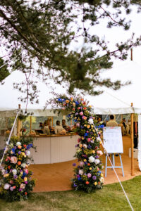 bright floral marquee wedding | family home wedding catering